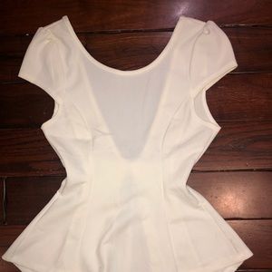 Cute white blouse with an open back